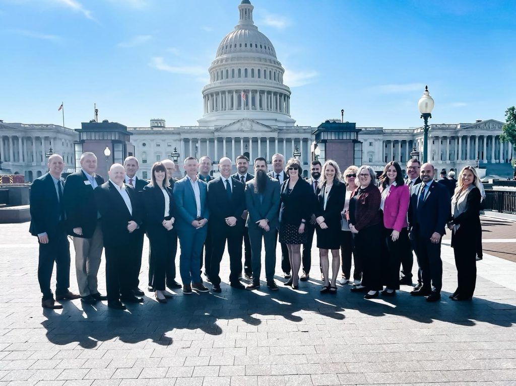 Ames Alliance members stand in front of Whitehouse during DC Fly In event